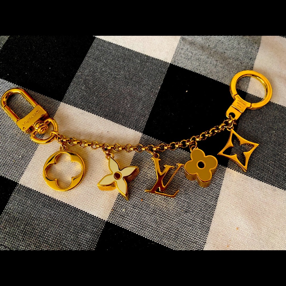 Statement Louis Vuitton purse jewlery.